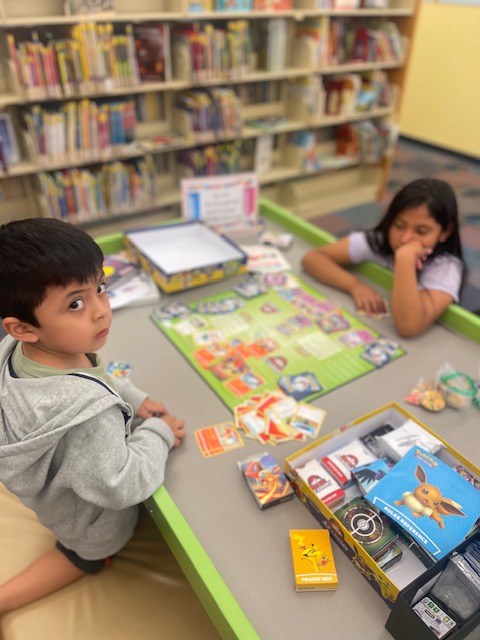 children reading in library